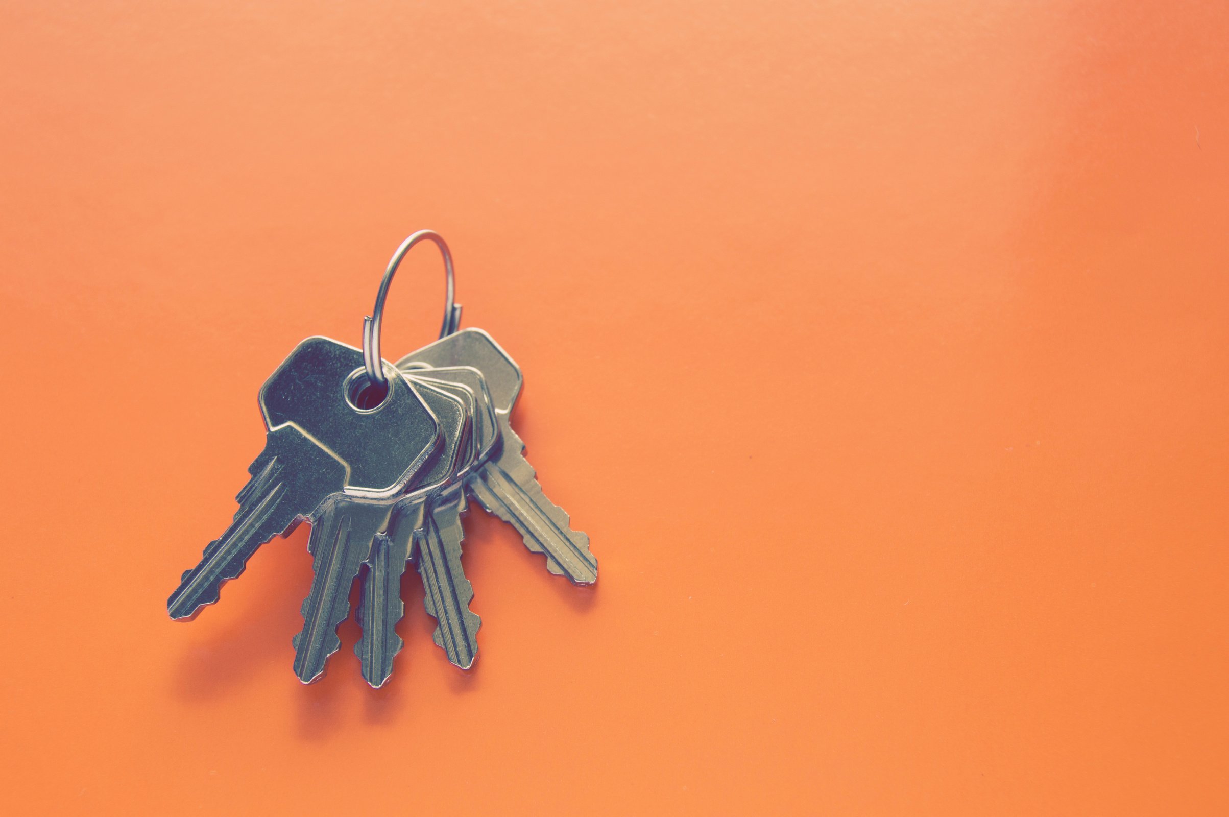 Photography of Keys on Orange Surface